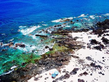 High angle view of beach against blue sky