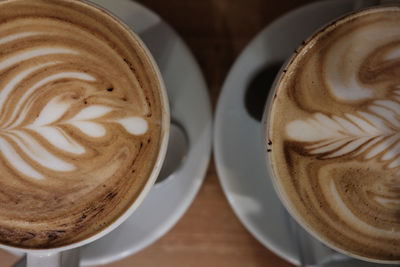 Close-up of cappuccino on table