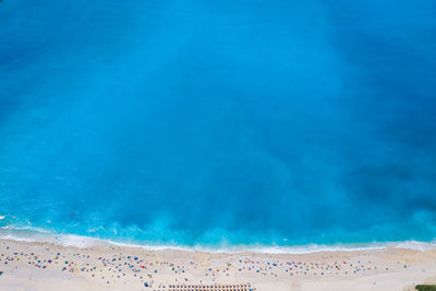 Scenic view of sea against blue sky