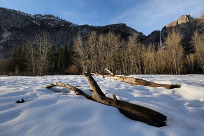 Scenic view of snow covered mountains