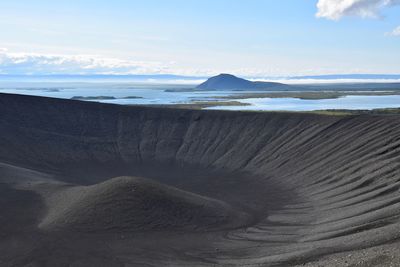 Scenic view of volcanic landscape against sky