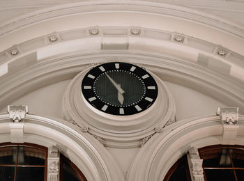 Low angle view of clock in building