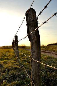 Fence on countryside landscape