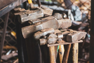 Close-up of rusty metal on wood