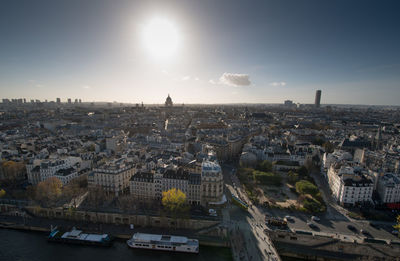 Cityscape against bright sky