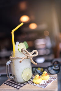 Close-up of drink with vegetables on table