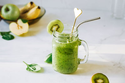 Vegan drink, detox diet smoothie of green fruits, vegetables