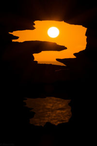 Silhouette of sun during sunset