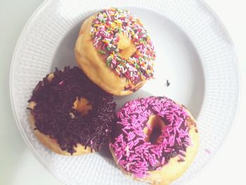 Directly above shot of donuts on plate