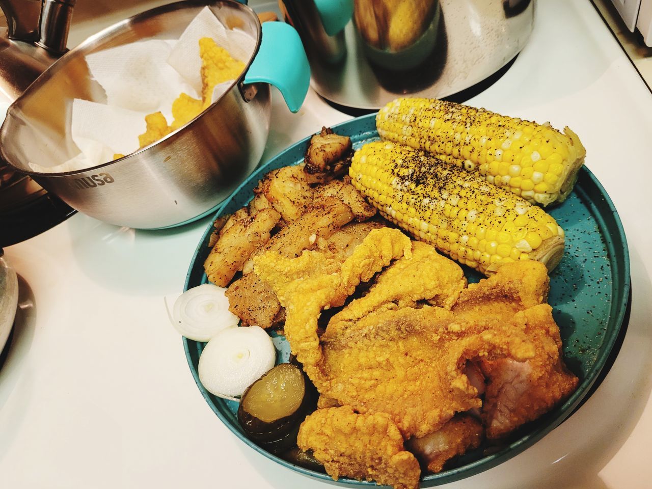 food and drink, food, meal, freshness, dish, breakfast, table, plate, indoors, fast food, high angle view, healthy eating, cuisine, serving size, fried food, no people, wellbeing, still life, household equipment, kitchen utensil, lunch, fried, bowl, chicken fingers, close-up, sweet food, snack