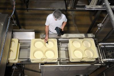 High angle view of man working in factory