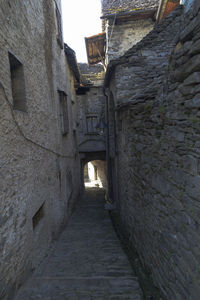 Narrow alley amidst buildings