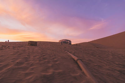 Water storage tanks with pipe line on sand in desert