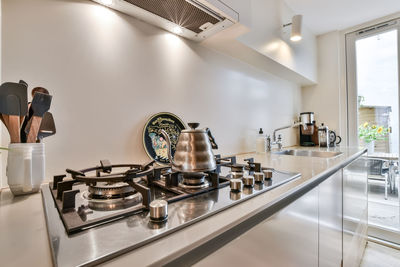 Close-up of gas stove in kitchen