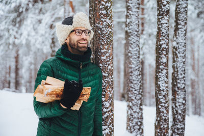 Full length of a man standing in snow