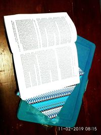 High angle view of book on table