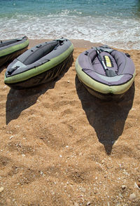 Boats moored at beach