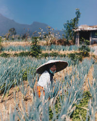 Portrait of female farmer working in farm