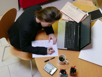 High angle view of woman working in office