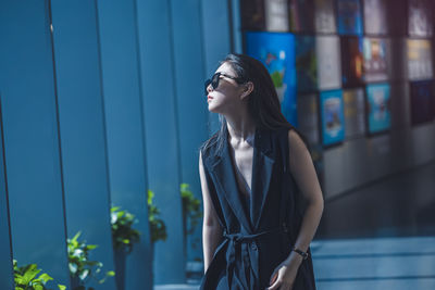 Young woman looking away outdoors