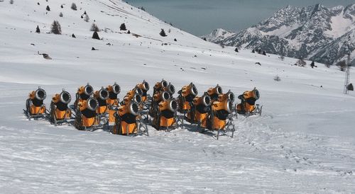 Group of people on snow covered field