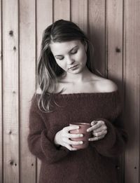 Young woman drinking coffee cup