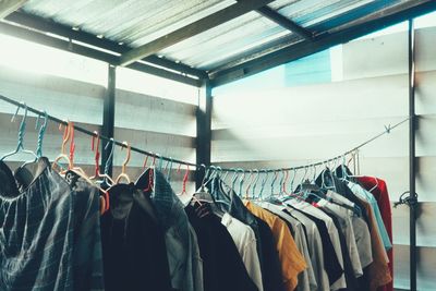 Low angle view of clothes hanging on rack