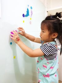 Cute girl playing with toy