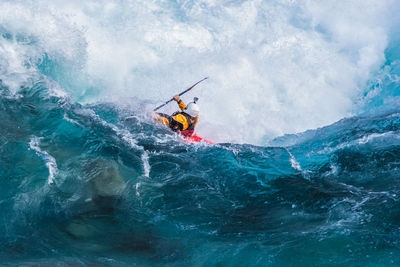 Kayaker descending the futaleufu river, a class 5 river in patagonia