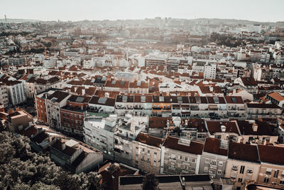 Panoramic aerial rooftop view of lisbon city: tiled roofs, wide angle