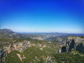 High angle view of landscape against clear blue sky