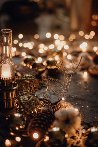 Close-up of illuminated christmas lights on table