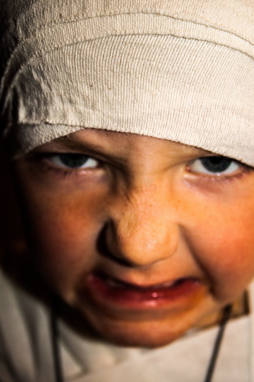 headshot, person, lifestyles, young adult, close-up, young men, indoors, portrait, looking at camera, human face, mid adult, mid adult men, front view, leisure activity, contemplation, serious, head and shoulders