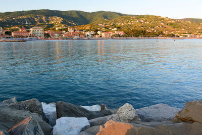 Scenic view of sea in town