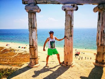 Full length of man on beach against sky