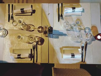 Directly above shot of glasses on table in restaurant