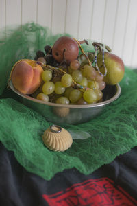 Close-up of fruits in plate on table