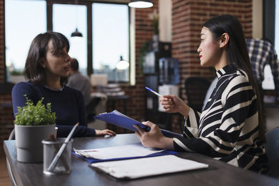 Businesswoman talking interview in office