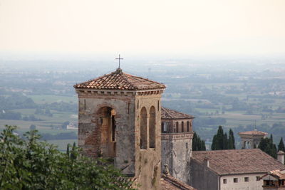 Historic building against sky in city, italy, asolo