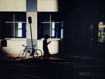 Full length of woman standing in city