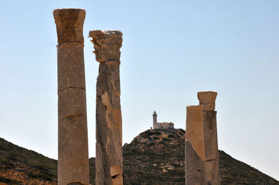 Low angle view of old ruins against sky