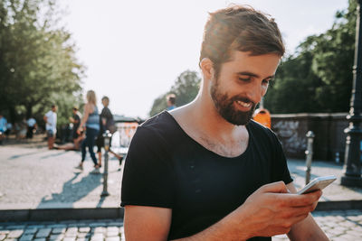 Young man using mobile phone