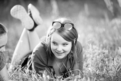 Portrait of smiling girl on field