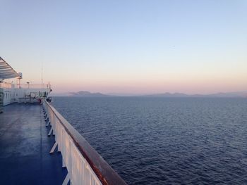 Scenic view of sea against clear sky during sunset