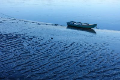 High angle view of boat moored on sea