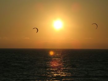 Scenic view of sunset over sea