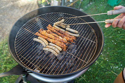 Close-up of meat on barbecue grill