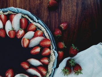 High angle view of strawberries on table