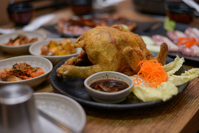 Close-up of food served on table