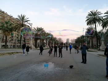 People in park against sky